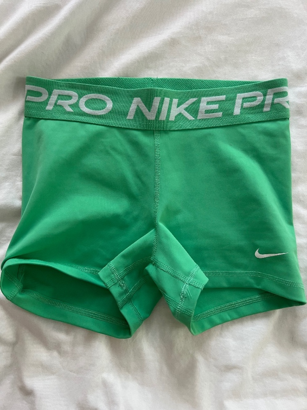 Green Nike Pro shorts